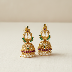 Opulent Antique Gold Jhumkas with Gemstone Embellishments