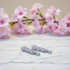 Sparkling Floral Cascade Drop Earrings with Aqua Accent